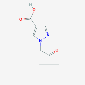 molecular formula C10H14N2O3 B1488979 1-(3,3-dimethyl-2-oxobutyl)-1H-pyrazole-4-carboxylic acid CAS No. 2098077-59-7