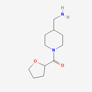 [1-(Oxolane-2-carbonyl)piperidin-4-yl]methanamine