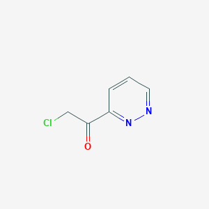 B1500389 2-Chloro-1-(pyridazin-3-yl)ethanone CAS No. 672950-15-1