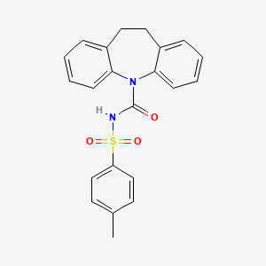 molecular formula C22H20N2O3S B15036909 N-[(4-methylphenyl)sulfonyl]-10,11-dihydro-5H-dibenzo[b,f]azepine-5-carboxamide 