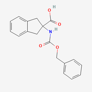 molecular formula C18H17NO4 B1504638 2-CBZ-AMINO-INDAN-2-CARBOXYLIC ACID CAS No. 91733-75-4