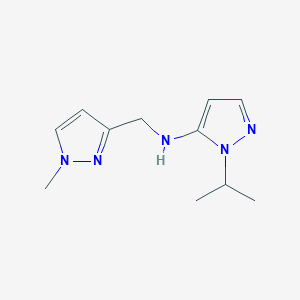 molecular formula C11H17N5 B15049694 N-[(1-methyl-1H-pyrazol-3-yl)methyl]-1-(propan-2-yl)-1H-pyrazol-5-amine 