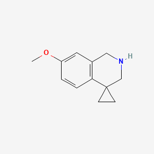 B1506001 7'-methoxy-2',3'-dihydro-1'H-spiro[cyclopropane-1,4'-isoquinoline] CAS No. 885269-33-0
