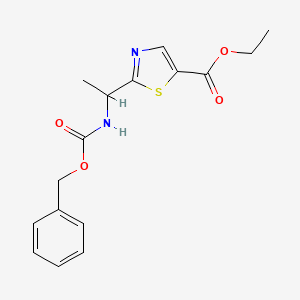 molecular formula C16H18N2O4S B1508778 Ethyl 2-(1-(((benzyloxy)carbonyl)amino)ethyl)thiazole-5-carboxylate CAS No. 1095823-50-9