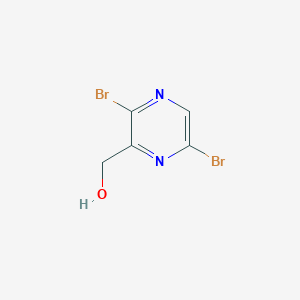 molecular formula C5H4Br2N2O B1510116 (3,6-Dibromopyrazin-2-YL)methanol 