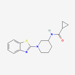 molecular formula C16H19N3OS B15120520 N-[1-(1,3-benzothiazol-2-yl)piperidin-3-yl]cyclopropanecarboxamide 
