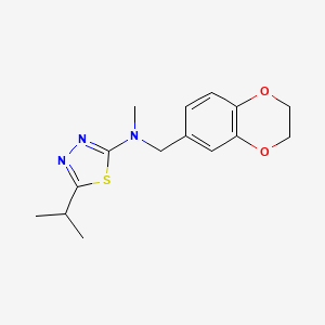 molecular formula C15H19N3O2S B15121557 N-[(2,3-dihydro-1,4-benzodioxin-6-yl)methyl]-N-methyl-5-(propan-2-yl)-1,3,4-thiadiazol-2-amine 
