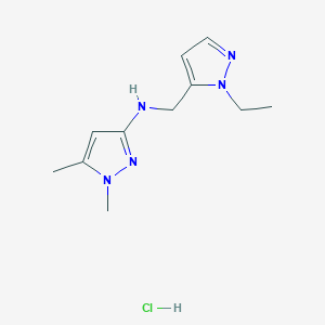 molecular formula C11H18ClN5 B15133572 N-[(2-ethylpyrazol-3-yl)methyl]-1,5-dimethylpyrazol-3-amine;hydrochloride CAS No. 1856070-05-7