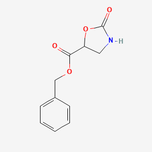 molecular formula C11H11NO4 B15156425 Benzyl 2-oxo-1,3-oxazolidine-5-carboxylate 