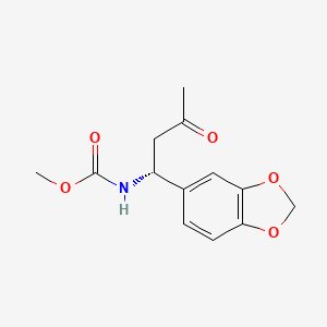 molecular formula C13H15NO5 B15159368 Methyl [(1R)-1-(2H-1,3-benzodioxol-5-yl)-3-oxobutyl]carbamate CAS No. 865086-35-7