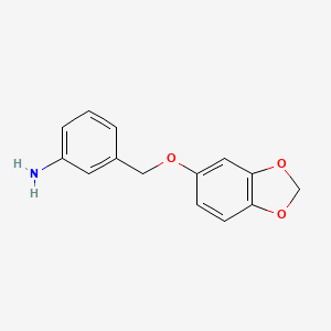 molecular formula C14H13NO3 B1517003 3-[(2H-1,3-benzodioxol-5-yloxy)methyl]aniline CAS No. 1019395-25-5
