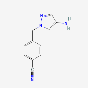 molecular formula C11H10N4 B1517016 4-[(4-amino-1H-pyrazol-1-yl)methyl]benzonitrile CAS No. 1152940-14-1