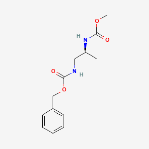 molecular formula C13H18N2O4 B1517118 benzyl N-[(2S)-2-(methoxycarbonylamino)propyl]carbamate 