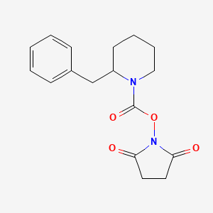 molecular formula C17H20N2O4 B15176320 (2,5-Dioxopyrrolidin-1-yl) 2-benzylpiperidine-1-carboxylate 