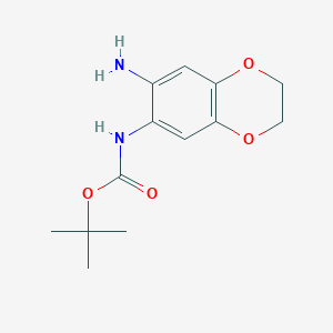 molecular formula C13H18N2O4 B1518249 tert-butyl N-(7-amino-2,3-dihydro-1,4-benzodioxin-6-yl)carbamate CAS No. 1156252-29-7