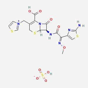 molecular formula C17H18N6O9S4 B15193699 (6R,7R)-7-[[(2E)-2-(2-amino-1,3-thiazol-4-yl)-2-methoxyiminoacetyl]amino]-8-oxo-3-(1,3-thiazol-3-ium-3-ylmethyl)-5-thia-1-azabicyclo[4.2.0]oct-2-ene-2-carboxylic acid;hydrogen sulfate CAS No. 128401-52-5