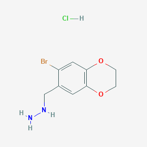 [(7-Bromo-2,3-dihydro-1,4-benzodioxin-6-yl)methyl]hydrazine hydrochloride