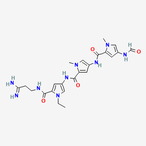 molecular formula C23H29N9O4 B15195202 N-(5-(((3-Amino-3-iminopropyl)amino)carbonyl)-1-ethyl-1H-pyrrol-3-yl)-4-(((4-(formylamino)-1-methyl-1H-pyrrol-2-yl)carbonyl)amino)-1-methyl-1H-pyrrole-2-carboxamide CAS No. 85407-02-9