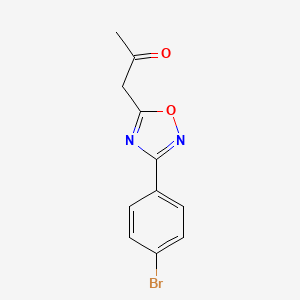 molecular formula C11H9BrN2O2 B1519731 1-[3-(4-Bromophenyl)-1,2,4-oxadiazol-5-yl]propan-2-one CAS No. 1204296-19-4