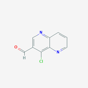 molecular formula C9H5ClN2O B15204878 4-Chloro-1,5-naphthyridine-3-carbaldehyde 