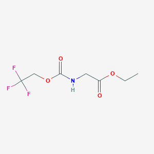 molecular formula C7H10F3NO4 B1521200 2-{[(2,2,2-三氟乙氧羰基)氨基]乙酸乙酯} CAS No. 1181459-00-6