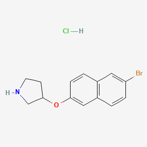 molecular formula C14H15BrClNO B1521419 3-[(6-Bromo-2-naphthyl)oxy]pyrrolidine hydrochloride CAS No. 1185303-57-4