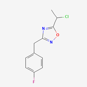 molecular formula C11H10ClFN2O B1521624 5-(1-Chloroethyl)-3-[(4-fluorophenyl)methyl]-1,2,4-oxadiazole CAS No. 1094291-16-3