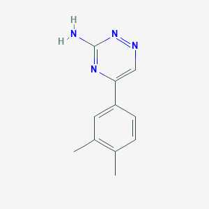 molecular formula C11H12N4 B1521704 5-(3,4-Dimethylphenyl)-1,2,4-triazin-3-amine CAS No. 1094385-33-7