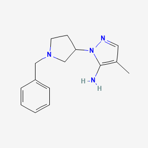 molecular formula C15H20N4 B1521714 1-(1-benzylpyrrolidin-3-yl)-4-methyl-1H-pyrazol-5-amine CAS No. 1152544-73-4