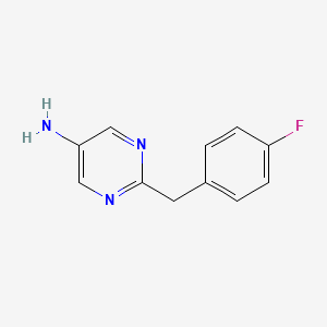 molecular formula C11H10FN3 B1521715 2-[(4-Fluorophenyl)methyl]pyrimidin-5-amine CAS No. 1152557-45-3