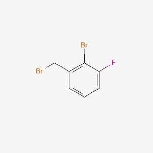 molecular formula C7H5Br2F B1521859 2-Bromo-1-(bromomethyl)-3-fluorobenzene CAS No. 1184918-22-6