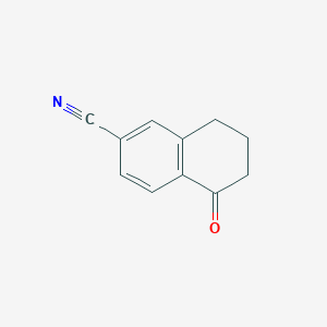 molecular formula C11H9NO B152273 6-氰基-1-茚满酮 CAS No. 90401-84-6