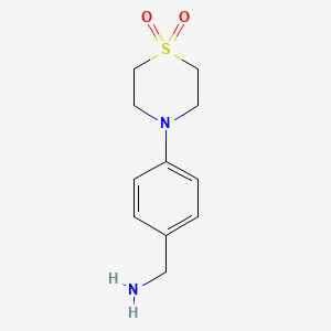 molecular formula C11H16N2O2S B1523112 4-[4-(Aminomethyl)phenyl]-1lambda6-thiomorpholine-1,1-dione CAS No. 1152880-11-9