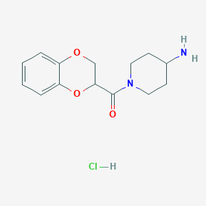 molecular formula C14H19ClN2O3 B1523361 (4-Aminopiperidin-1-yl)(2,3-dihydrobenzo[b][1,4]dioxin-2-yl)methanone hydrochloride CAS No. 1281025-81-7