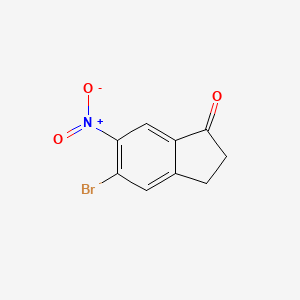 molecular formula C9H6BrNO3 B1523398 5-bromo-6-nitro-2,3-dihydro-1H-inden-1-one CAS No. 723760-74-5