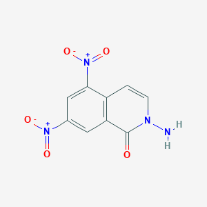 molecular formula C9H6N4O5 B1524963 2-Amino-dinitro-isoquinolin-1one CAS No. 1082042-08-7