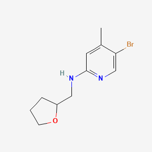 5-bromo-4-methyl-N-(oxolan-2-ylmethyl)pyridin-2-amine