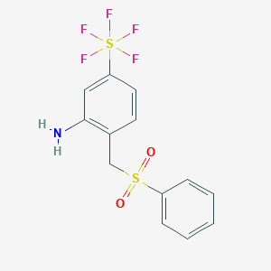 B1525648 2-Benzesulfonylmethyl-5-(pentafluorosulfanyl)aniline CAS No. 1309569-49-0