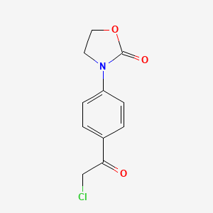 molecular formula C11H10ClNO3 B1525790 3-[4-(2-Chloroacetyl)phenyl]-1,3-oxazolidin-2-one CAS No. 1354950-60-9