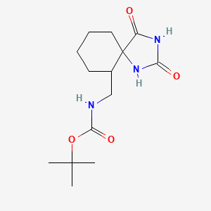 molecular formula C14H23N3O4 B1526001 tert-butyl N-({2,4-dioxo-1,3-diazaspiro[4.5]decan-6-yl}methyl)carbamate CAS No. 1354950-10-9