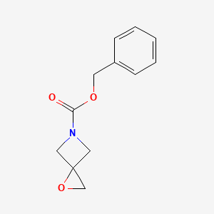molecular formula C12H13NO3 B1526080 1-Oxa-5-azaspiro[2.3]hexane-5-carboxylic acid phenylmethyl ester CAS No. 934664-22-9