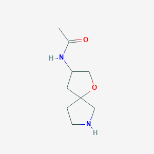 molecular formula C9H16N2O2 B15262727 N-{1-oxa-7-azaspiro[4.4]nonan-3-yl}acetamide 