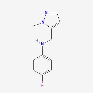 molecular formula C11H12FN3 B15265548 4-fluoro-N-[(1-methyl-1H-pyrazol-5-yl)methyl]aniline 