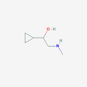molecular formula C6H13NO B1526758 1-Cyclopropyl-2-(methylamino)ethan-1-ol CAS No. 1365836-30-1