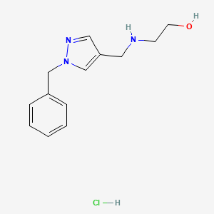 2-{[(1-benzyl-1H-pyrazol-4-yl)methyl]amino}ethan-1-ol hydrochloride