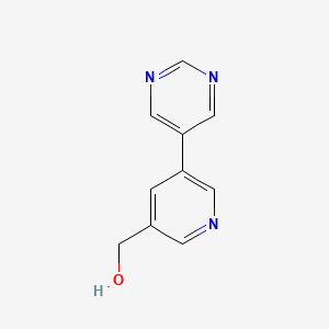 molecular formula C10H9N3O B1527988 (5-(Pyrimidin-5-yl)pyridin-3-yl)methanol CAS No. 1346809-30-0