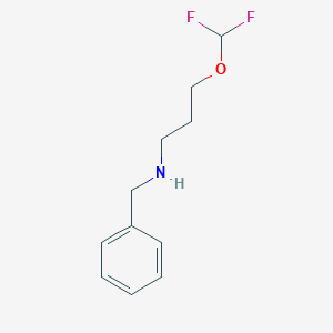 molecular formula C11H15F2NO B1528140 Benzyl[3-(difluoromethoxy)propyl]amine CAS No. 1593441-93-0
