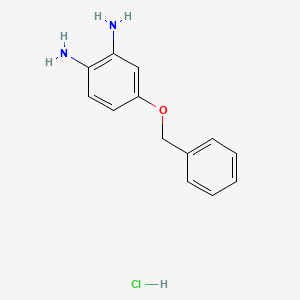 molecular formula C13H15ClN2O B1528285 4-(Benzyloxy)benzene-1,2-diamine hydrochloride CAS No. 1803591-53-8