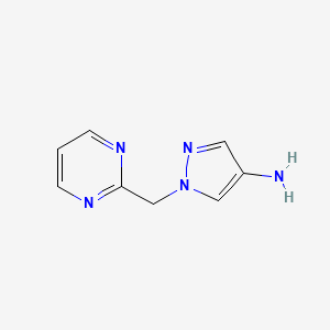 molecular formula C8H9N5 B1528657 1-(pyrimidin-2-ylmethyl)-1H-pyrazol-4-amine CAS No. 1339145-54-8