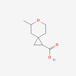 5-Methyl-6-oxaspiro[2.5]octane-1-carboxylic acid